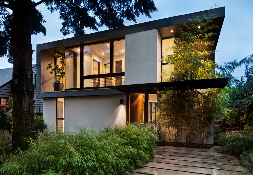 modern home exterior lit at twilight